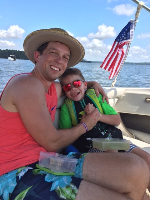 man and son on boat