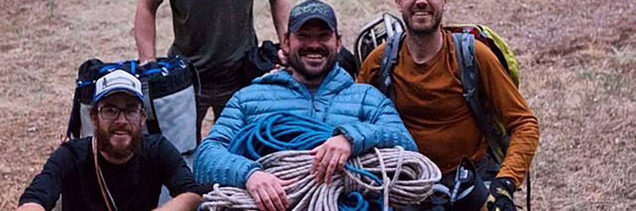 What Independence Means to Me as a Person With Spina Bifida Enock with his climbing team.