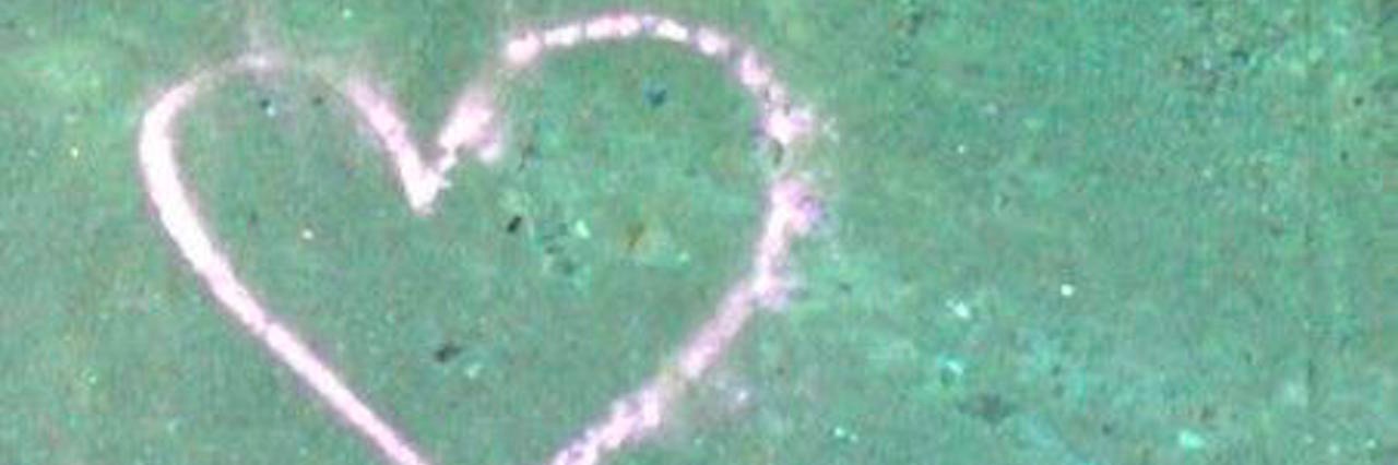 Depression in Relationships: You Don't Have to Fight Your Demons Alone chalk heart on the street