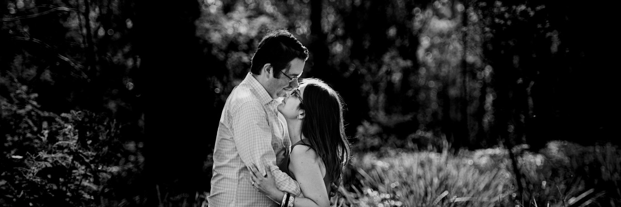 A Letter to My Husband, From Your Wife Who's Been Suicidal husband and wife kissing in forest