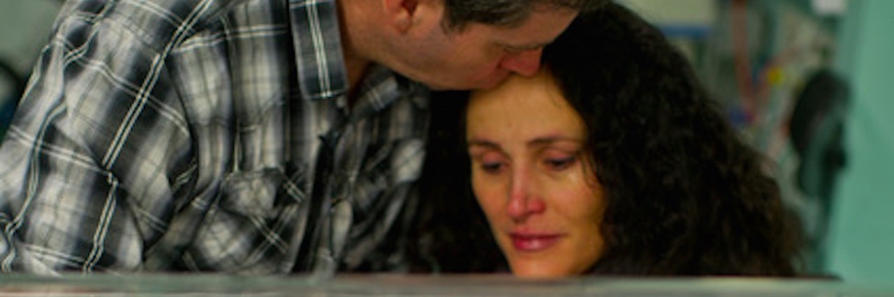 Letter to Friend From Bereaved Parent Parents with baby in incubator in hospital