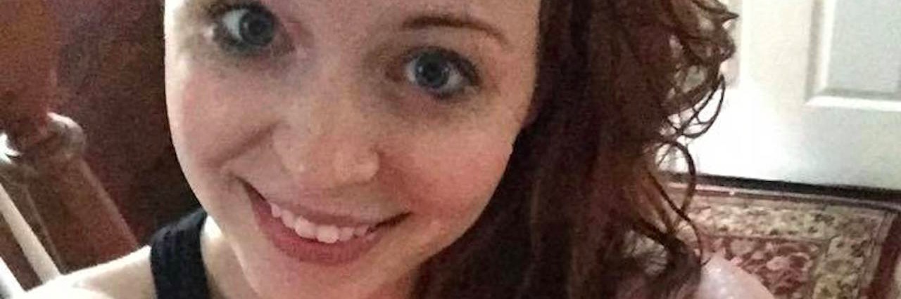 How I Cope With the 'Rain Pain' selfie of woman in workout shirt that says fighter