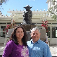 Contributor and husband in front of yoda statue