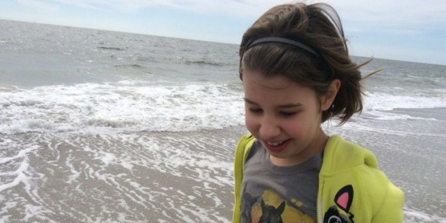 When Someone Asks My Medically Complex Daughter What She Wants To Be When She Grows Up Katherine Erby's daughter on the beach.