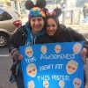 Two women dressed as Mickey and Minnie Mouse holding a sign for Ellen Degeneres Show