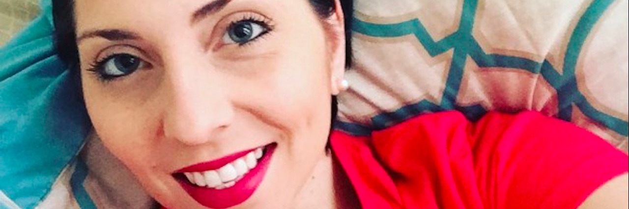 The 4 Stages of Grief After Being Diagnosed with RA woman wearing red mighty t shirt