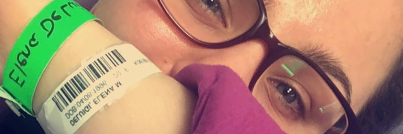 What It Was Like to Be on Suicide Watch in a Psych Ward for 16 Days author in psych ward with hospital bracelets