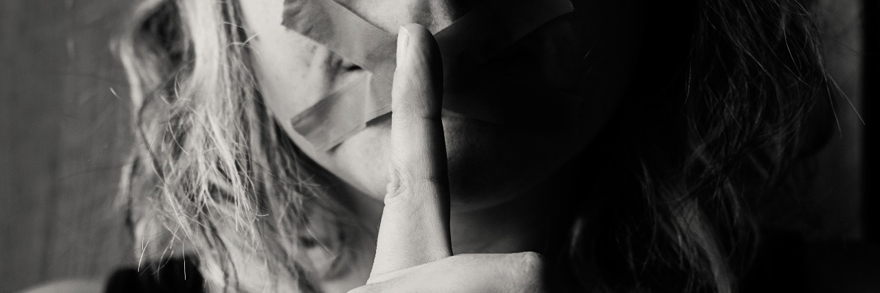 Why Writing Is Helpful When You Have a Mental Illness Black and white girl with finger to lips and X across mouth