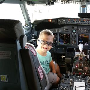 "Little Levi" Krystosek tours the cockpit before his Miracle Flight.