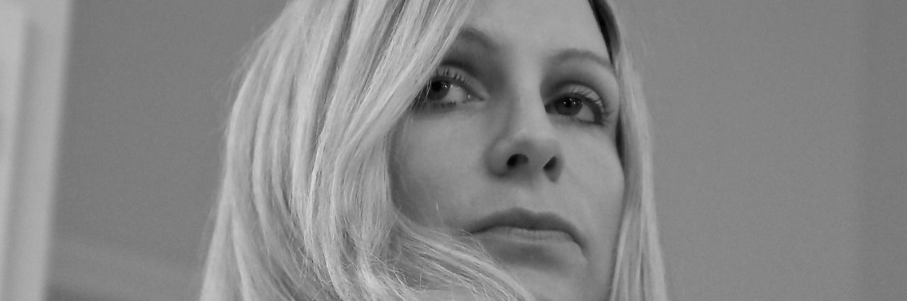 Self-Portraits: Learning to Love My Body woman looking over her shoulder