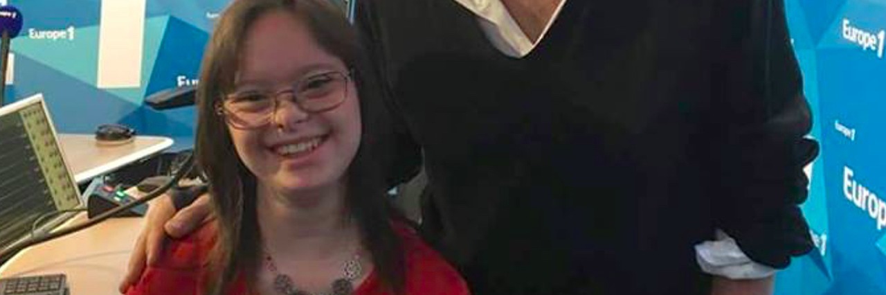 Mélanie Ségard Is France's First Weather Woman With Down Syndrome Melanie Segard at her local news station with a reporter.