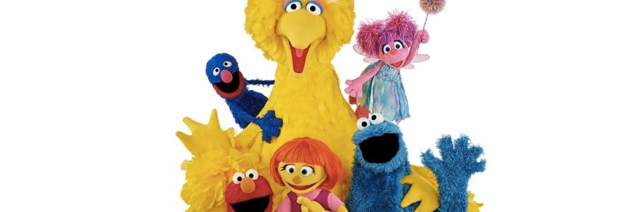 PBS KIDS to Air Autism-Related Episodes of Popular Children's Shows Photo of Sesame Street characters including Big Bird, Abby Kadabby, Grover, Elmo, Cookie Monster and Julia