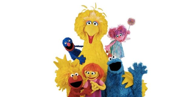 Photo of Sesame Street characters including Big Bird, Abby Kadabby, Grover, Elmo, Cookie Monster and Julia