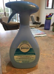 Bottle of Febreeze spray on counter at home