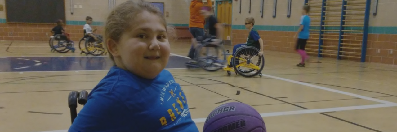 Obamacare Saved My Daughter, Who Is Disabled little girl in wheelchair playing basketball