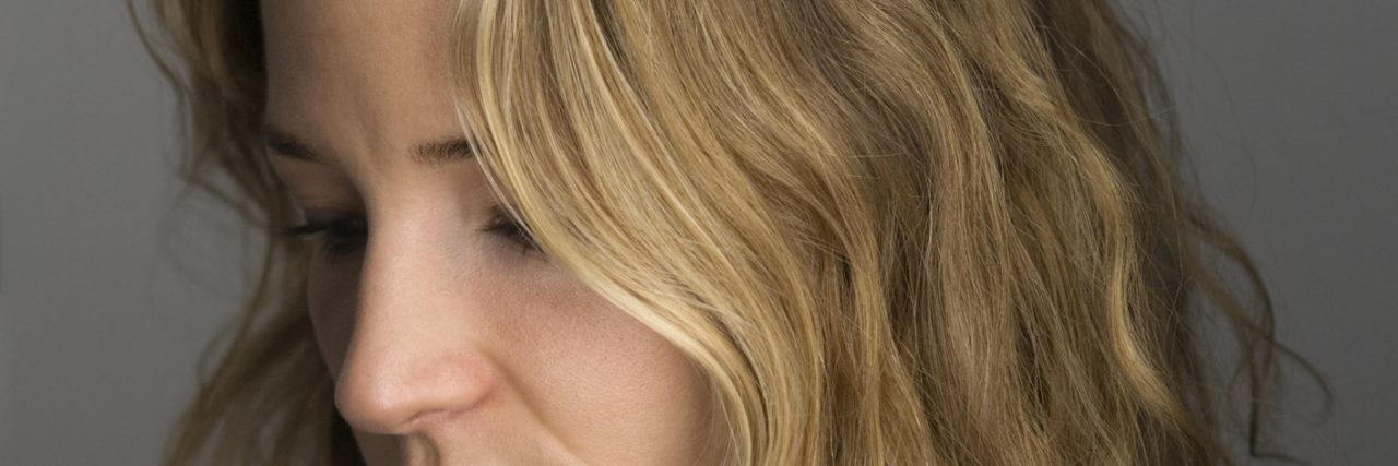 How to Help a Loved One With Depression Serious, uncertain woman posing for portrait