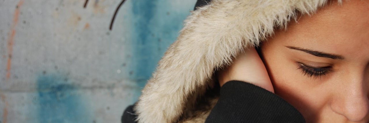 What My Life Is Like as a Teen With Borderline Personality Disorder teen girl covering her ears