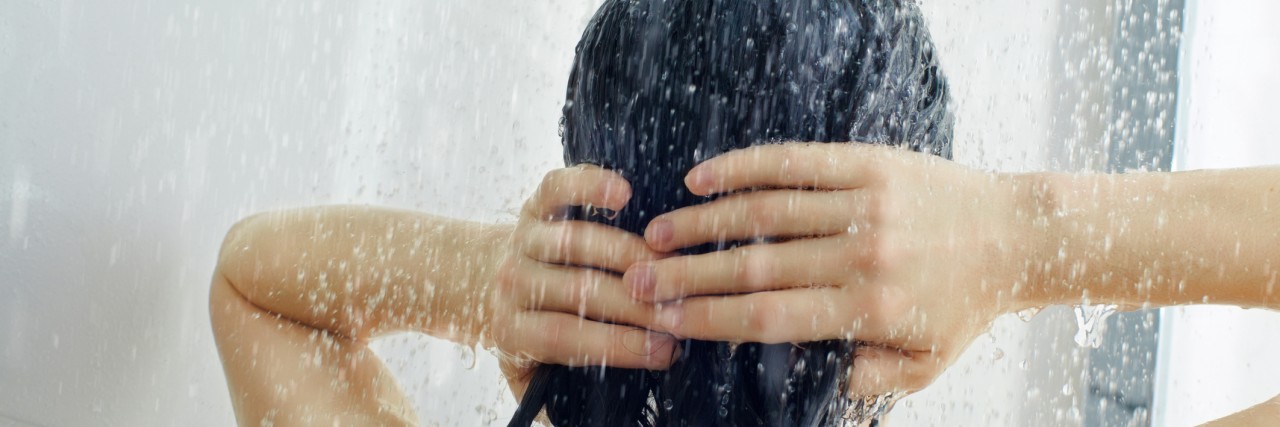 Showering Uses Too Much Energy When You Have Bipolar Disorder a beautiful girl standing at the shower