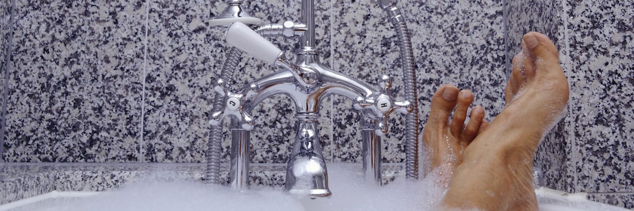 25 Self-Care Tips for People Who Hate Self-Care Young woman in bath, low section