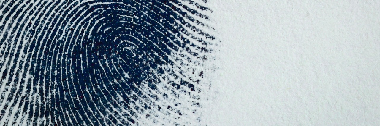 Dealing With Criminal Prosecution After a Suicide Attempt Thumbprint on paper.