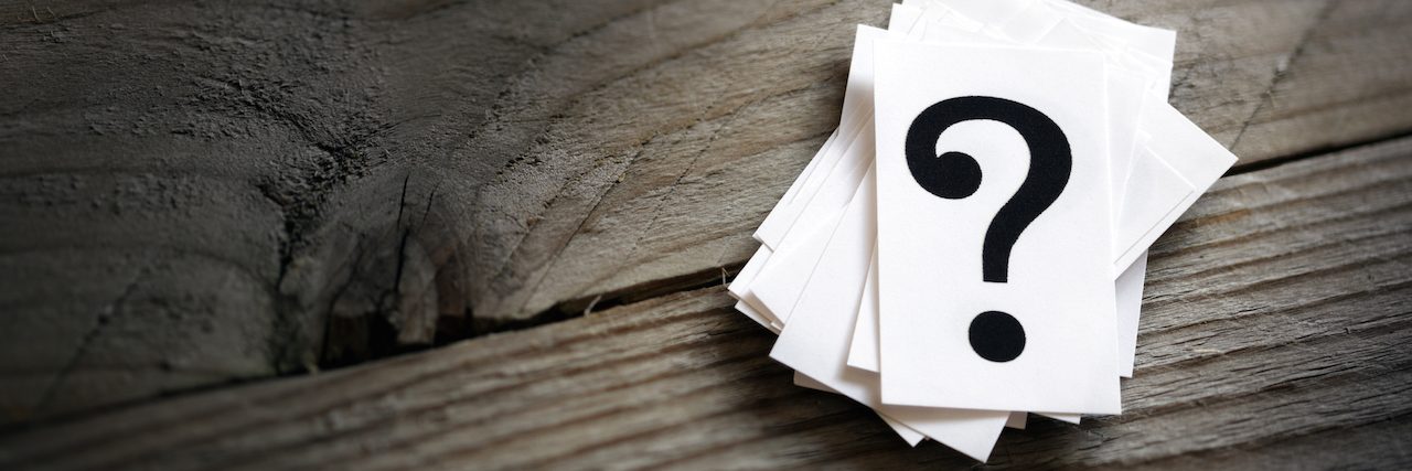 6 Questions to Ask Yourself Before Assuming Everyone Hates You A pile of question marks