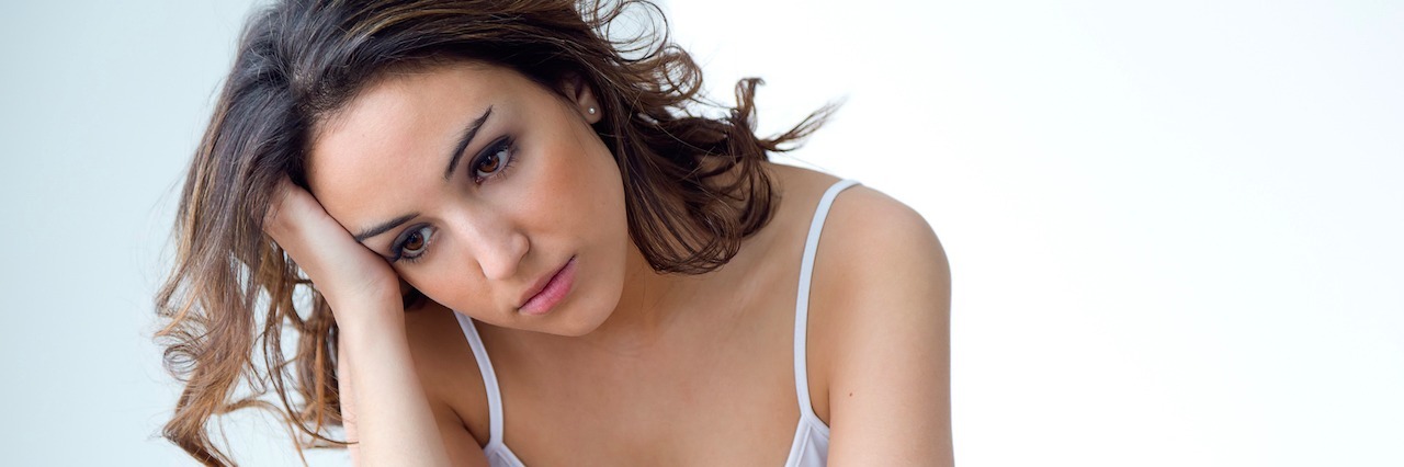 Avoiding Depression and Anxiety, and Better Ways to Cope A woman who looks sad