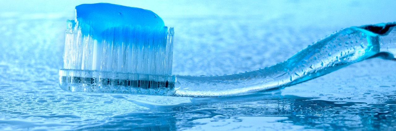 Autism: Battling My Fear of the Dentist toothbrush with toothpaste on it