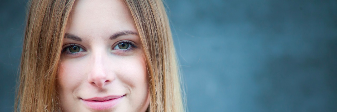 A Letter to My Body in Eating Disorder Recovery blonde woman smiling