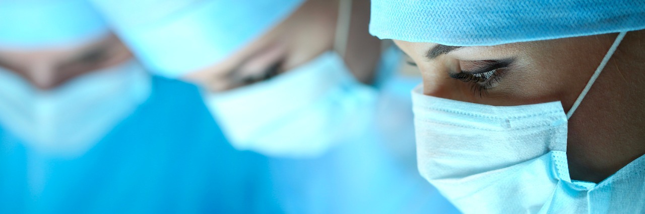 Reuniting With the Trauma Surgeon Who Saved My Life Twice Three surgeons at work