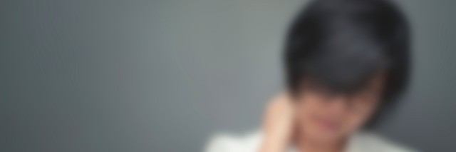 Blurred and de-focused, Asian young woman pain in neck.