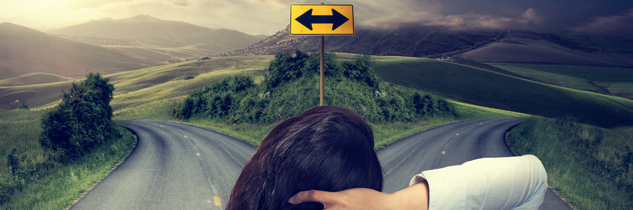 Educating the Public About Dwarfism Woman standing at a fork in the road.