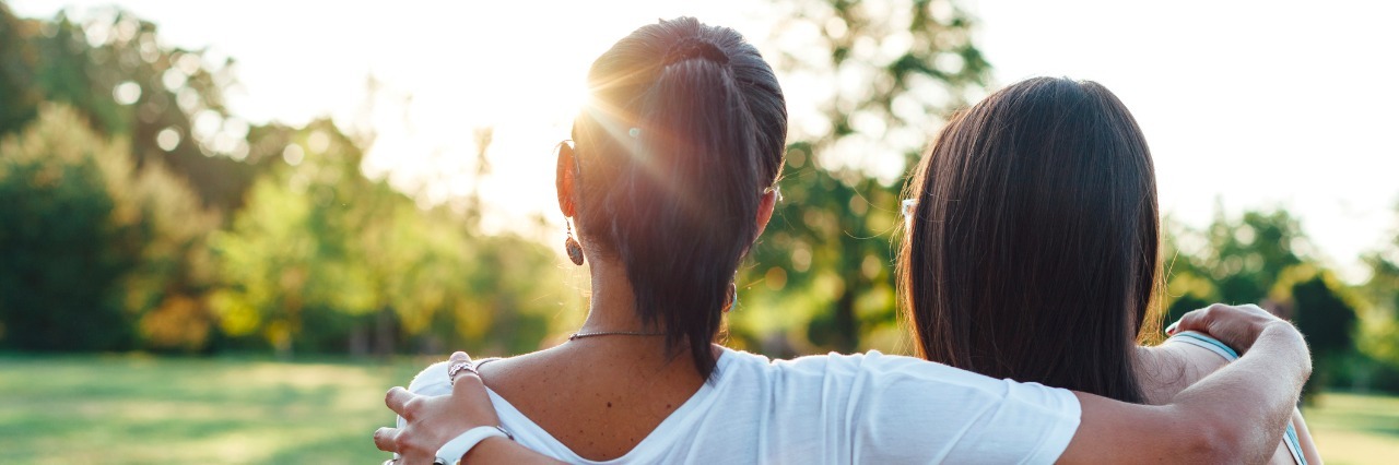 For Mothers Who Blame Themselves for Their Kid's Eating Disorder Mom and daughter embracing