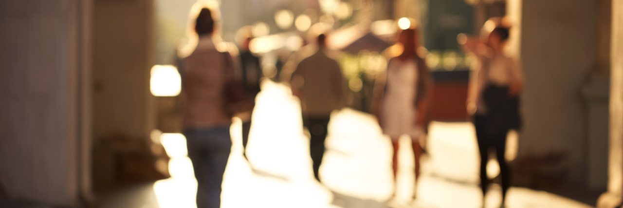 The 'No Big Deal' Acts of Kindness That Helped Me After Suicide Loss Blurred background of unrecognizable persons