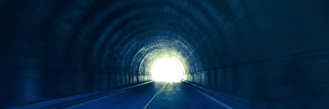 dark tunnel with light at the end