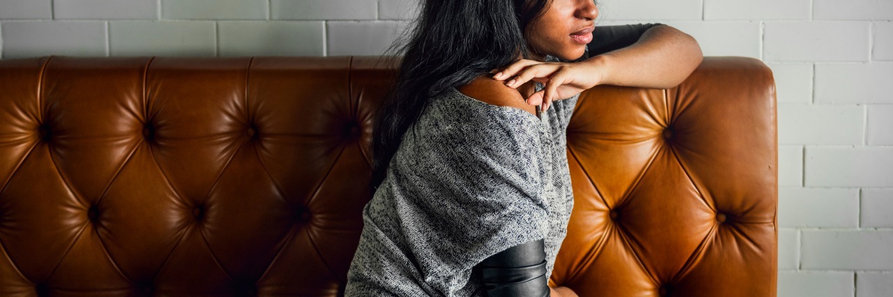 What It's Like Having a Psoriatic Arthritis Woman Drinks Coffee Shop Lonely Concept