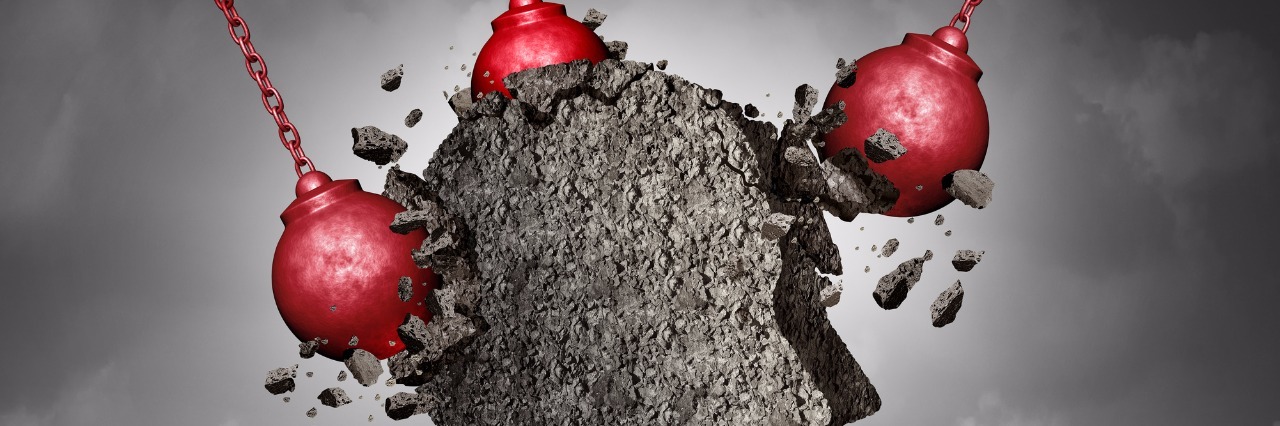 6 Questions to Ask When I Have a Migraine Flare Painful Headache pain and pounding migraine concept as a human head made of cement being destroyed or renovated by a group of wrecking ball objects