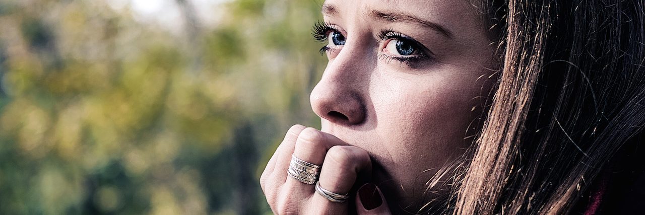 Finding Good Days With Depression Terrifying A woman biting her nails