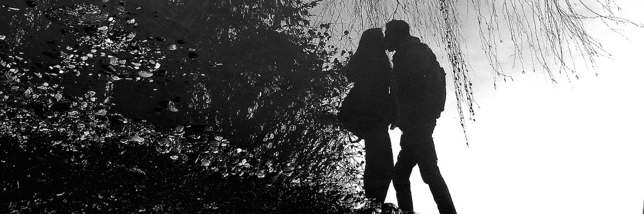 To The Girls Who Have Dated My Depression picture of a couple kissing in front of a free
