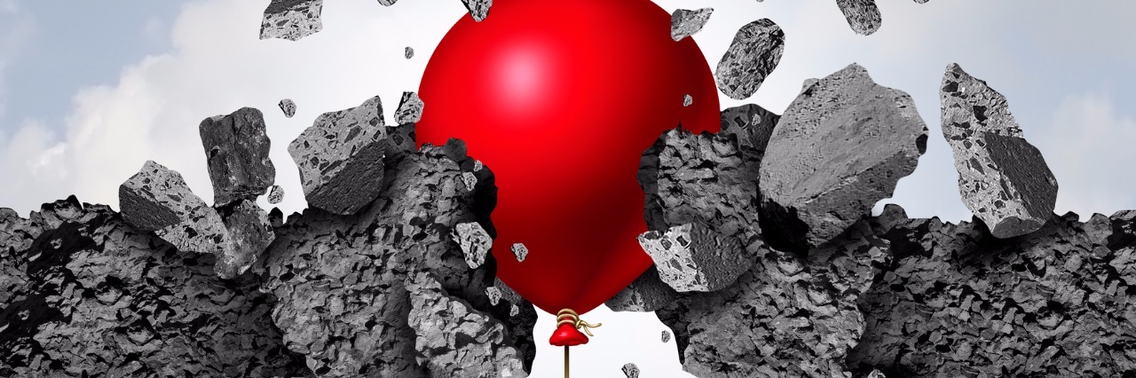 Why I Stopped Smiling Through the Pain unexpected power and success as a red balloon breaking through a cement wall as a business achievement metaphor with 3D illustration elements.