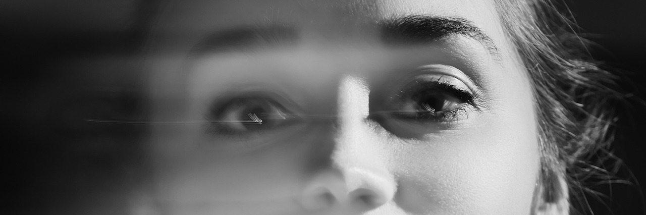 The Types of Lies My Depression Tells Me A blurry portrait of a woman