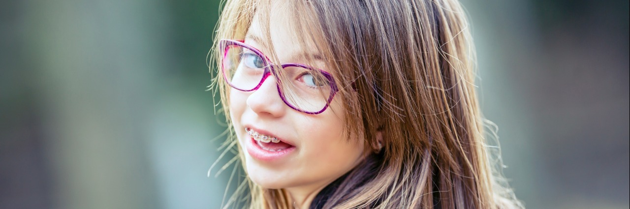 A Letter to the Teenage Me Struggling With Generalized Anxiety teenager girl with braces