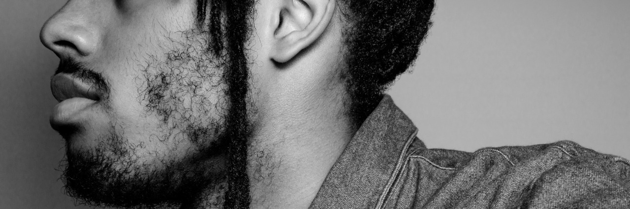 The Voices of Perfectly Hidden Depression profile of black teenager with denim shirt
