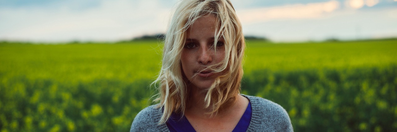 I'm an Addicted Mom Withdrawing From Dexedrine and Xanax a woman standing in front of a field