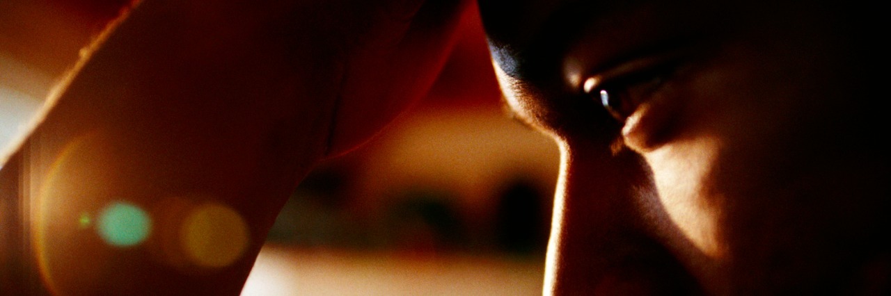 Why We Shouldn’t Pretend to Be OK When We’re Grieving Man with hand on forehead, looking down