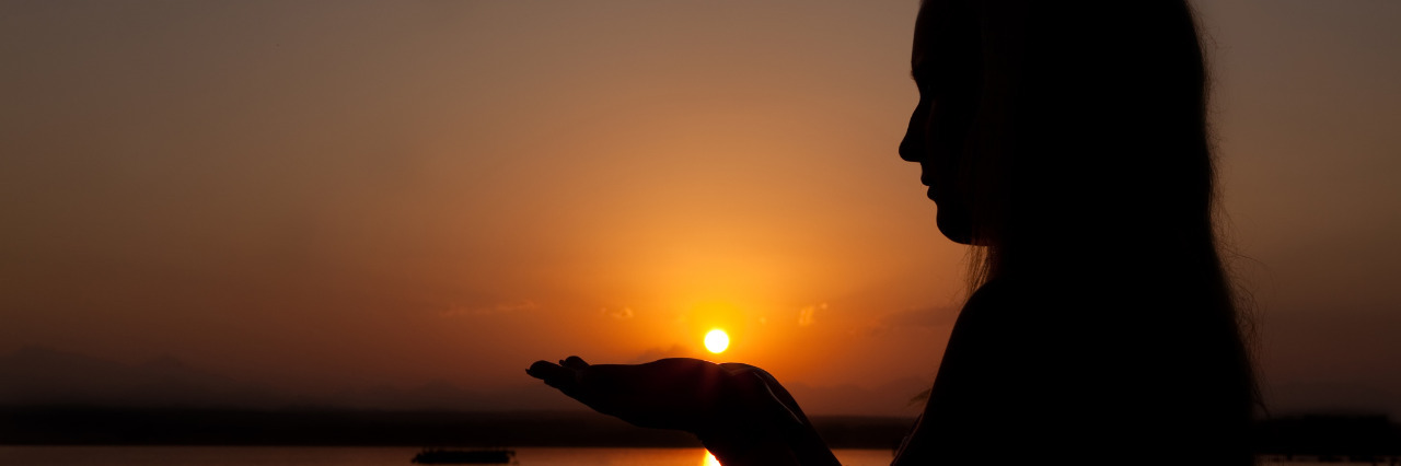 Being Proactively Fearless With Cerebral Palsy Woman at sunset.