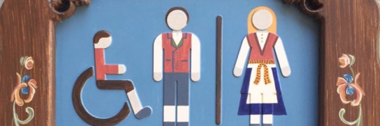 Amy Schinner Writes 'Mouse Ears for Everyone' Disney Disability Guide Companion restoom sign