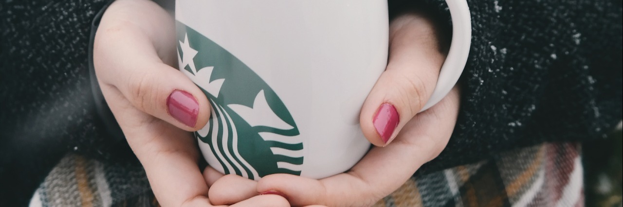 To the Starbucks Barista Who Doesn't Judge Me for My Eating Disorder woman with scarf holding starbucks coffee mug