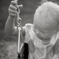 little girl on swings