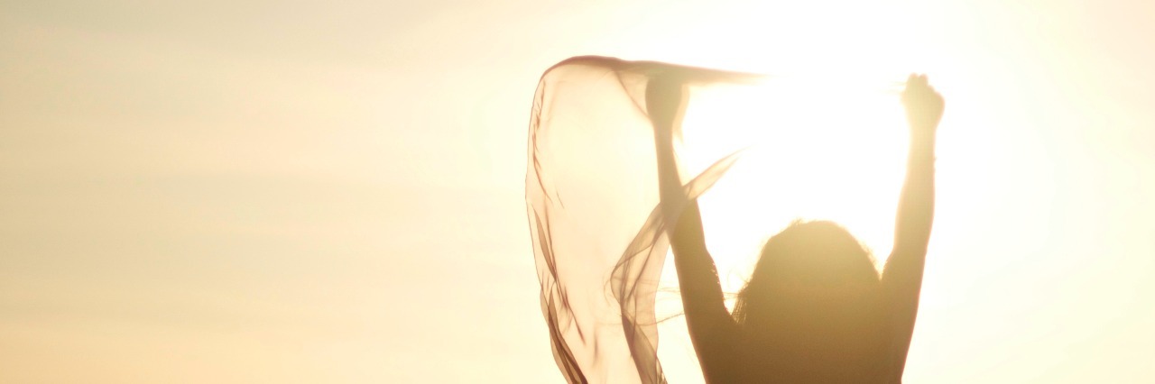 A Poem for Anyone Who Wants to Give Up woman in the sun