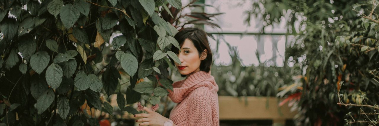 The Guilt of Being Depressed woman behind ivy